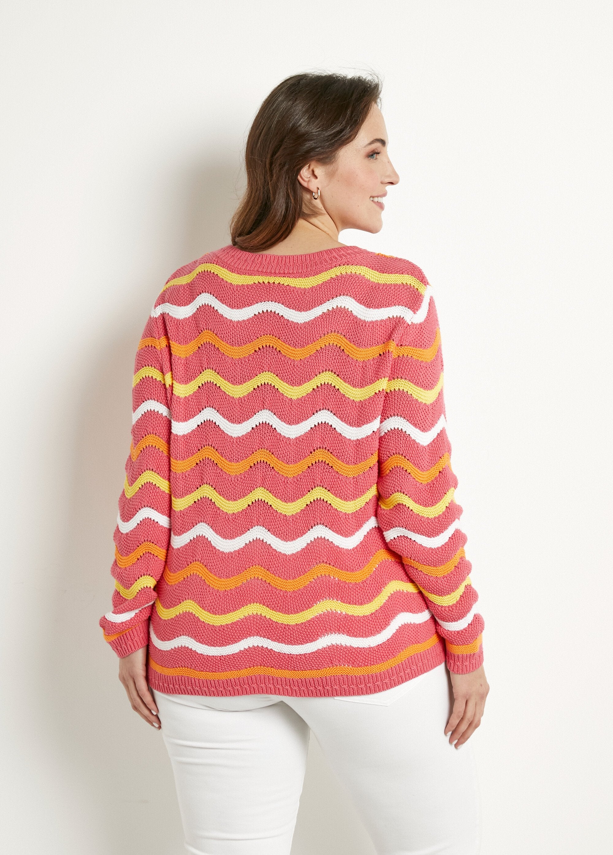 Soft_round_neck_sweater_with_raised_stripes_and_garter_stitch_Pink_background_DO1_curvy